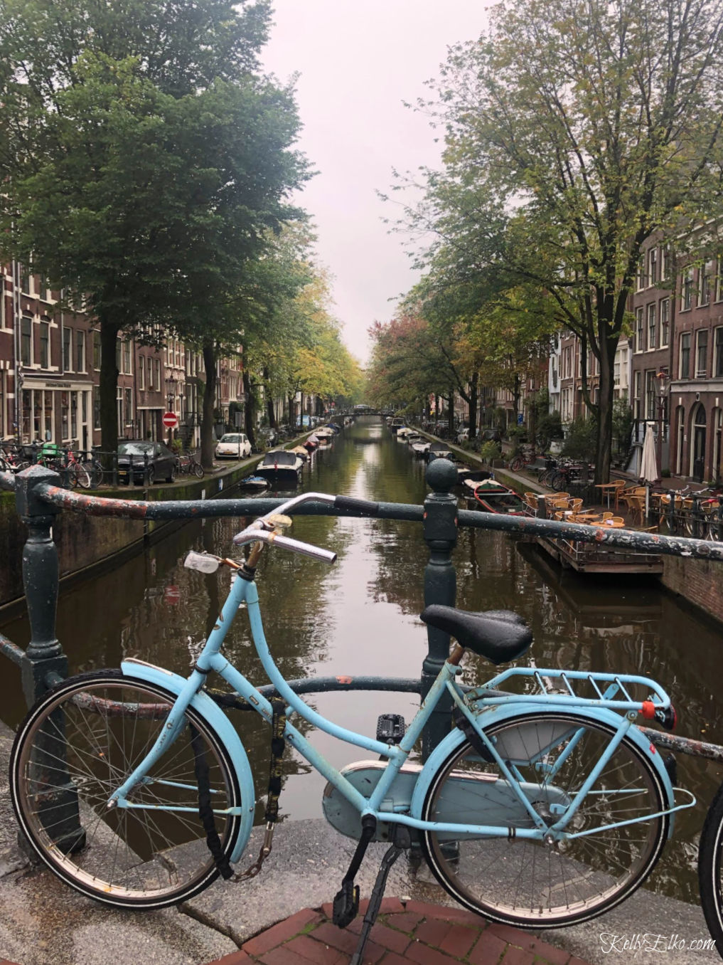 Amsterdam has 165 canals and more bikes than people! kellyelko.com #amsterdam #netherlands #canals #amsterdambike #amsterdamcanal #travel #travelblog #travelblogger #kellyelko