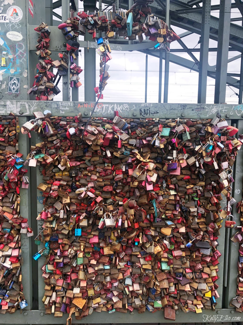 Love Locks bridge in Cologne Germany kellyelko.com #lovelocksbridge #colognegermany #travel #rivercruise #rhineriver