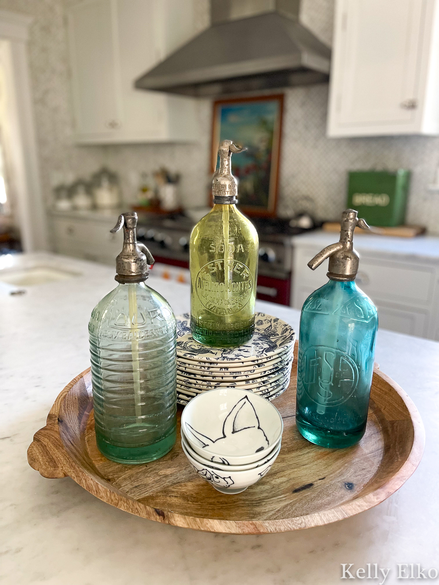 https://www.kellyelko.com/wp-content/uploads/2023/03/vintage-seltzer-bottles-kitchen-decor.jpg